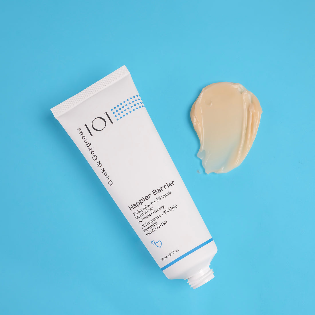 A tube of Happier Barrier moisturizer on white background.