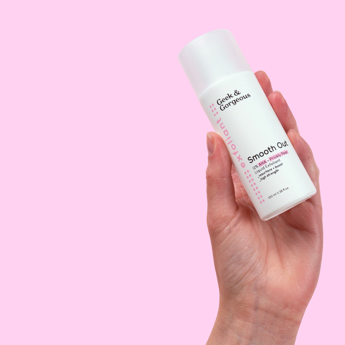 A bottle of full-sized Smooth Out exfoliator on white background.